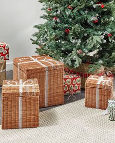 wicker wrapped presents under a christmas tree