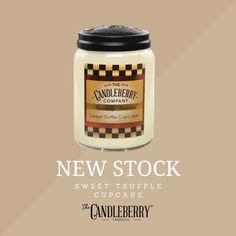 a candle is shown with the words new stock sweet truffle cupcake on it