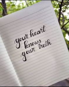 an open notebook with writing on it that says, you're heart knows your truth