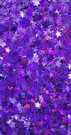 purple and pink stars are scattered on the ground