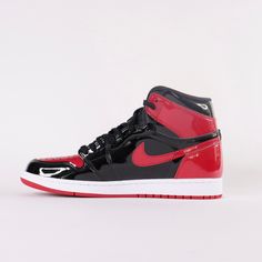 Debuted in 1985, the Air Jordan 1 Patent Bred offers a rendition to the iconic classic. Released December 30th, 2021. * Encapsulated Air Sole * Genuine patent leather in the upper offers durability * Air Jordan ball and wings logo on side * Black toe colour blocking Size and Fit* Fits true to size Air Jordan 1 Patent Bred, Jordan 1 Patent, Best Friends Shoot, Wings Logo, Colour Blocking, Nike Air Jordan 1, Air Jordan 1, Nike Air Jordan, Men's Sneakers