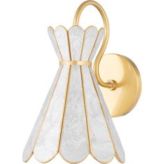 a gold and white wall light with a glass shade on the front of it's arm