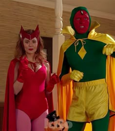 two people in costumes standing next to each other