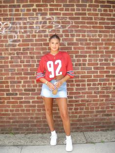 #denim #skirt #jersey #outfit #coffeeoutfit #2024 #trendy Jersey Tailgate Outfit, Louisville Game Day Outfit, Tail Gate Outfit College, Cute Blackout Outfits For Football Games, Gameday Inspo Outfits, Jersey And Denim Skirt Outfit, Sport Theme Outfit, Denim Skirt And Converse Outfit, How To Make A Jersey Look Cute