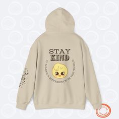 Bbokari Felix "STAY Kind" SKZoo Hoodie with Inspirational Quote | Stray Kids Unisex Hooded Sweatshirt for STAYs STAY inspired and cozy with this set of SKZoo hoodies, featuring your favorite Stray Kids characters alongside uplifting quotes featuring a reference to the best fans in the world. This collection of Rhyming Orange-designed hoodies are designed to empower every STAY and celebrate the incredible qualities of the group members. Made from a soft 50% cotton, 50% polyester blend, these Gildan unisex heavy blend hoodies provide comfort and style with a classic fit, double-lined hood, and kangaroo pocket. Perfect for expressing your love for SKZ while spreading positivity! Features: - Material: 50% cotton, 50% polyester - Fit: Unisex, classic fit with a double-lined hood - Ribbed cuffs Sporty Cartoon Print Hooded Hoodie, Sporty Hooded Hoodie With Cartoon Print, Playful Hooded Hoodie For Streetwear, Playful Letter Print Hoodie For Winter, Playful Hoodie With Drawstring Hood For Streetwear, Playful Winter Hoodie With Letter Print, Playful Letter Print Winter Hoodie, Playful White Hoodie For Streetwear, Stray Kids Shoes