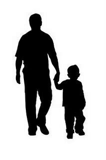 a man holding the hand of a small child