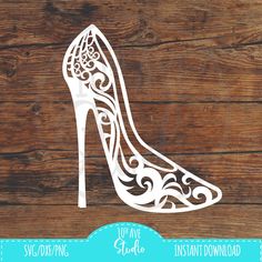 a high heeled shoe cutout on a wooden background