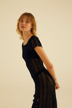 She is the moment- introducing the IT DRESS of the YEAR- the Mariposa Lace Midi Dress. Single layered soft sheer lace. Lettuce trim detail. Rounded neckline midi dress featuring front tie bow detailing. Can be worn alone with the Mariposa Lace Bralette and Panty, paired with a slip underneath, or over your favorite pair of vintage jeans for an elevated look. Your new favorite year-round statement piece. Fit Details ✿ ✦ True to size✦ Stretchy, Delicate✦ Polyamide Elastane✦ Hand wash cold, lay fla