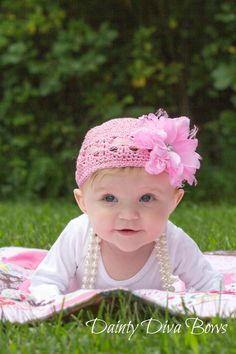 A beautiful hat for your beautiful baby! Our Pink Infant Kufi Hat will fit newborns and infants up to approximately 9 months of age. Our hats have unique features typically not found elsewhere! We add to these crocheted hats a pink and white polka dot ribbon with a small adjuster in the back of the hat, so you can tighten and loosen as needed to ensure a perfect fit for your little one. Additionally, the Vintage Lace flower on the front side of the hat is removable, so as your child outgrows the Adjustable Flower Hat As A Gift, Cute Pink Wedding Hat, Adjustable Hats With Handmade Flowers For Gifts, Adjustable Hats With Handmade Flowers As Gift, Adjustable Pink Crochet Hat As Gift, Adjustable Hat With Handmade Flowers As Gift, Cute Adjustable Hat For First Birthday, Flower Crochet Hat, Kufi Hat