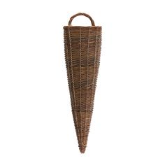 a brown wicker bag hanging from the side