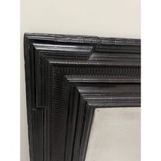 three black frames are stacked on top of each other