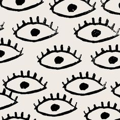 black and white drawing of an eye with spikes on it's sides, against a gray background