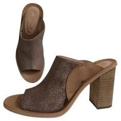 Silver Gray/Gunmetal Embossed Snakeskin Leather And Beige/Tan Leather. Leather Insoles. Leather Soles. 3 1/2'' Stacked Heel. Made In Spain. Size Eu 39. Eu Sizes Can Run 1/2 To A 1 Size Smaller Us Sizes. With Box. Nwt Free People Mule/Sandal Open Toe Leather 77255/248 Bshelf Last Photos Are To Give You An Idea Of Heel Height And Fit. Brown Almond Toe Sandals With Deep Heel Cup, Brown Closed Toe Mules For Evening, Designer Leather Mules With Reinforced Heel, Gold Leather Almond Toe Sandals, Brown Block Heel Mules For Evening, Chic Heels With Sculpted Metallic Leather, Gold Sandals With Sculpted Heel And Almond Toe, Gold Leather Mules For Spring, Designer Open Toe Mules With Reinforced Heel