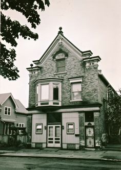 an old brick building with two story windows