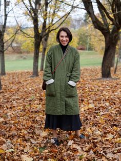 "Meet the cushy cousin of your favourite quilted jacket QUINCE -- reversible linen coat GOJI. All of what you already love, just with some extra length and warmth. The 'outer' layer is offered in heavy-weight linen of your choice and paired with the inner layer from Natural linen.  STYLE DETAILS * Knee length * Made from heavy-weight linen with Natural (medium) lining.  * Loose fit  * Wrap, kimono-style tie fastening  * Double-sided (reversible) * 2 patch pockets on 'outer' side * Decorative seam on the 'inner' side * Padded with 85% cotton, 15% polyester pads SIZES & COLORS IN THE PICTURES * Model 1 is wearing size M/L in Moss Green (heavy) Model's height - 170 cm (5'7\"), bust - 87 cm (34.3\"), waist - 72 cm (28.3\"), hips - 100 cm (39.4\"). * Model 2 is wearing size S/M in Honey Yellow Quilted Cotton Jacket, Kimono Coat Pattern, Quilted Coat Outfit, Quilted Housecoat, Quilt Coat Pattern, Long Quilted Jacket, Long Padded Coat, Quilted Jacket Pattern, Quilted Kimono