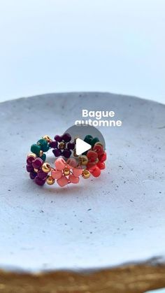 Naomi on Instagram: "BAGUE D’AUTOMNE 🍁🍂🧡 Une bague en perles avec de petites fleurs aux jolies teintes automnales.   J’utilise  Du fil Beadalon 7 brins et des perles dorées @perlesandco  Des perles de rocailles @amazon.fr   #diy #loisirscreatifs #doityourself #easydiy #bijouxfaitmain" On Instagram, Instagram