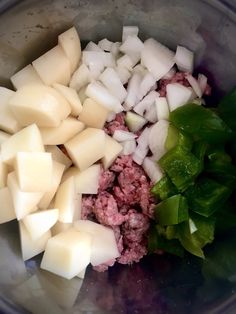 diced meat and chopped vegetables in a bowl