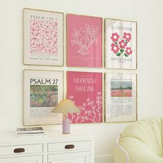 a white dresser topped with drawers and pictures on the wall