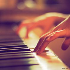 someone is playing the piano with their hands