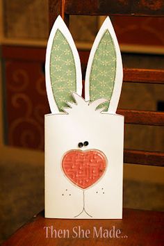 a card with an image of a rabbit's head on it and the words, then she made