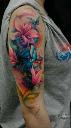 a person with a colorful tattoo on their arm