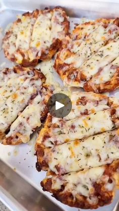 several pieces of pizza sitting on top of a pan