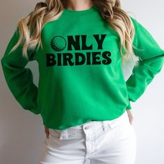 Looking for a cozy way to show off your golf obsession? Check out this hilarious crewneck sweatshirt that proudly boasts "Only Birdies" on the front! Perfect for chilly days on the course or cozy nights in, this sweatshirt is sure to be a hit with golf enthusiasts everywhere. So grab your clubs and get ready to tee off in style with this fun golf sweatshirt! .:These Gildan 1800 sweatshirts feel like your favorite well-loved sweatshirt.  Material  .: 50% cotton, 50% polyester .: Medium-heavy fabr Cotton Long Sleeve Golf Sweatshirt, Sporty Letter Print Sweatshirt For Golf, Green Crew Neck Top For Golf, Casual Golf Sweatshirt With Crew Neck, Sporty Crew Neck Golf Sweatshirt, Sporty Crew Neck Sweatshirt For Golf, Golf Girl, Golf Sweatshirt, Golf Sweater