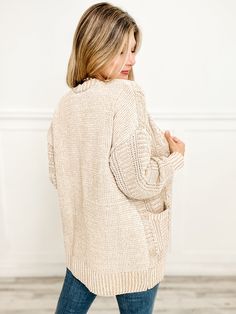 Elevate your wardrobe with our must-have Two Tone Oversized Sweater Cardigan! Featuring an oversized fit and two tone design, this cardigan is perfect for layering and adding a pop of color to any outfit. Plus, the two spacious pockets provide both style and functionality. Stay cozy and stylish this season! 95% Cotton, 5% Spandex Oversized V-neck Sweater In Neutral Color, Oversized Beige Cotton Cardigan, Oversized Beige Cardigan With Button Closure, Versatile Oversized V-neck Cardigan, Oversized Cozy V-neck Cardigan, Oversized Sweater Cardigan, Oversized Sweater, Sweater Cardigan, Must Haves