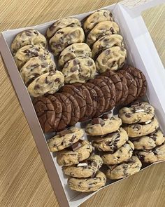 a box filled with cookies and chocolate chip cookies