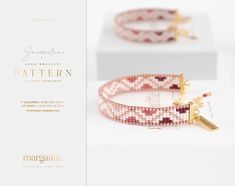 two bracelets with gold charms and pink beading on white surface next to box