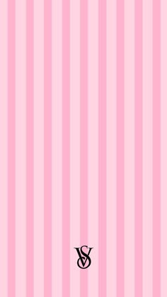 a pink striped wall with a black and white symbol on the bottom right hand corner