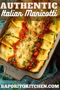 a casserole dish filled with ravioli and sauce in a baking pan on top of a blue towel