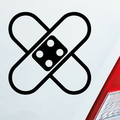 a black and white sticker on the back of a car that has a dice in it