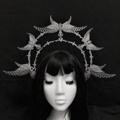 Guardian headwear Beautiful host of angels design, with large winged, adorned with crosses, mini angel wings and beautiful decorative filigree. Great to wear for photoshoots, events or to just look fabulous.  Free UK postage Prices to other countries may vary  This design will take between 3-4 weeks during busy times. ------------------------------------------------- Headwear Guide -Headwear comes in one size which is flexible and has been pre-adjusted to be the most comfortable whilst still having enough grip to stay in place. You can adjust the size slightly by lightly pulling or pushing the bottom of the headwear. This is not recommended to do excessively as it can damage the design -Large headwear piece can be top heavy if bending the head down so please either secure the item to the h Angels Design, Gala Outfits, Fantasy Jewellery, Mini Angel, Angel Halo, Gothic Crown, Character Fashion, Gala Outfit, Crown Design