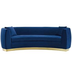 a blue couch with gold trim on the back and arm rests against a white background