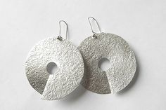 natural finish Sterling Silver Circle Earrings With Oxidized Finish, Contemporary Sterling Silver Earrings With Oxidized Finish, Contemporary Silver Earrings With Oxidized Finish, Modern Sterling Silver Earrings With Oxidized Finish, Modern Oxidized Finish Earrings For Everyday, Unique Earrings Weird, Earrings Weird, Plain Silver Rings, Simple Silver Jewelry