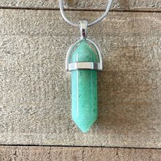 Gorgeous Teal Crystal Pendant In Silver Setting On A 16" Silver Snake Chain With Lobster Claw Clasp. I Believe This To Be Either Aventurine Or Simulated Aventurine But Am Not 100% Sure. It's Beautiful Nonetheless. Stone Measures Approx 1 3/8” Long. Comes With Jewelry Box For Safe Shipping And Easy Gifting! I Ship Daily! Thank You For Supporting My Small Business, I Appreciate Each And Every Customer & Order :) #042 Silver Crystal Necklaces With Natural Jade Stones, Elegant Silver Jade Crystal Necklace With Natural Stones, Handmade Aventurine Pendant Jewelry, Silver Aventurine Crystal Necklace For Healing, Aventurine Pendant Crystal Necklaces With Natural Stones, Silver Jade Crystal Necklace With Natural Stones, Silver Jade Crystal Necklace With Gemstone, Bohemian Aventurine Pendant Necklace, Silver Jade Gemstone Crystal Necklace