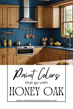 a kitchen with blue walls and wooden cabinets, the words paint colors that go with honey oak