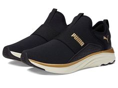 PUMA Softride Sophia Slip-On - Women's Shoes : Puma Black/Puma Gold/Warm White : Run freely wearing the PUMA Softride Sophia Slip-On sneakers. Textile and synthetic upper. Textile lining and insole. Slip-on design. Round toe. Pull tab on lace and heel counter. PUMA logo and perforated detail on upper. Synthetic outsole. Imported. Measurements: Weight: 8 oz Product measurements were taken using size 8.5, width B - Medium. Please note that measurements may vary by size. Weight of footwear is based Puma Shoes Women, Womens Puma, Shoes Puma, Puma Logo, Black Puma, Puma Shoes, Mom Boss, Pumas Shoes, Lace Fashion