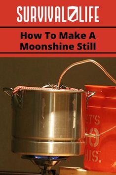 a metal pot sitting on top of a stove next to a red can and an orange bucket