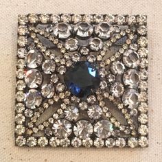 Vintage Sorrell Originals 1980s Stone Square Brooch Pin. Blue Center Stone Surrounded By Amazing Shiny Clear Stones In A Beautiful Square Pattern. Marked Sorrell Originals On Silver Back. Measures 2.5 Inches All Around. Very Unique And Rare. Very Hard To Find. In Absolutely Pristine Condition. One Of A Kind Piece! A1. Vintage Crystal Embellished Brooches For Formal Events, Silver Bling Brooches For Evening, Silver Costume Jewelry Brooches For Party, Antique Aesthetic, Lion Necklace, Vintage Rhinestone Brooch, Unique Brooch, Vintage Purse, Clear Stone