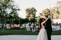 a bride and groom sharing their first dance