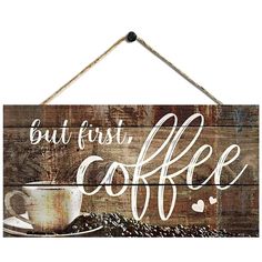 a wooden sign that says but first, coffee with a cup of coffee on it