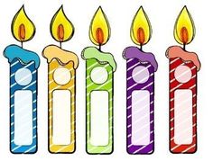 four candles in different colors with one lit