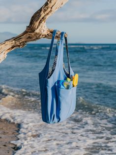 FINAL SALE! No returns or exchanges allowed. Bring our water-resistant, multi-tasking, nylon cargo tote on your everyday adventures. It’s durable, spill-proof, and roomy enough for a full day of work and play. Beach bag, travel tote, grocery hauler, diaper bag, gym, weekender; You name it, and our Cargo Tote can handle it. Main body 16" base long length, 12" depth/width, sidewall height 12" shoulder strap drop length 11.75". Fabric Content: 100% nylon exterior and 100% poly lining Travel Tote Bag With Water Bottle Pocket, Blue Multifunctional Bag For Everyday Use, Blue Multifunctional Everyday Bag, Multifunctional Blue Bag For Everyday, Multifunctional Blue Everyday Bag, Blue Bag With Water Bottle Pocket For Outdoor Activities, Multifunctional Blue Bags For Outdoor, Blue Multifunctional Outdoor Bags, Multifunctional Blue Outdoor Bags