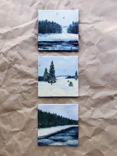 three pieces of paper with paintings on them