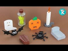 there are some legos that have been placed on the table for halloween decorating