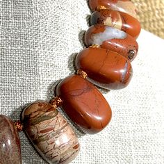 Irregular-shaped natural semi-precious Red Jasper stone Brown Gemstone Beads Nature-inspired Necklace, Nature-inspired Brown Gemstone Bead Necklace, Earthy Brown Beaded Gemstone Necklaces, Earthy Brown Beaded Necklaces With Gemstones, Brown Jasper Gemstone Necklaces, Brown Jasper Gemstone Bead Necklace, Brown Jasper Gemstone Beaded Necklace, Brown Jasper Gemstone Bead Necklaces, Brown Jasper Necklace With Gemstone Beads