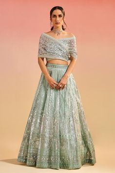 Sea green attached cancan lehenga with all over floral foil embroidery. Paired with scallop trimmed wrap around blouse with all over sequins and floral embroidery. - Aza Fashions Studio Iris, Reception Outfit, Organza Embroidery, Organza Lehenga, Anamika Khanna, Diana Penty, Bridal Jumpsuit, Draped Blouse