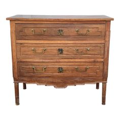 an old wooden dresser with brass handles and knobs on the drawers, isolated against a white background